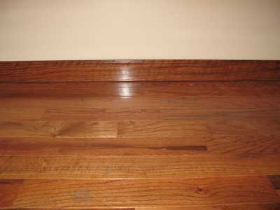wood floor and custom baseboard